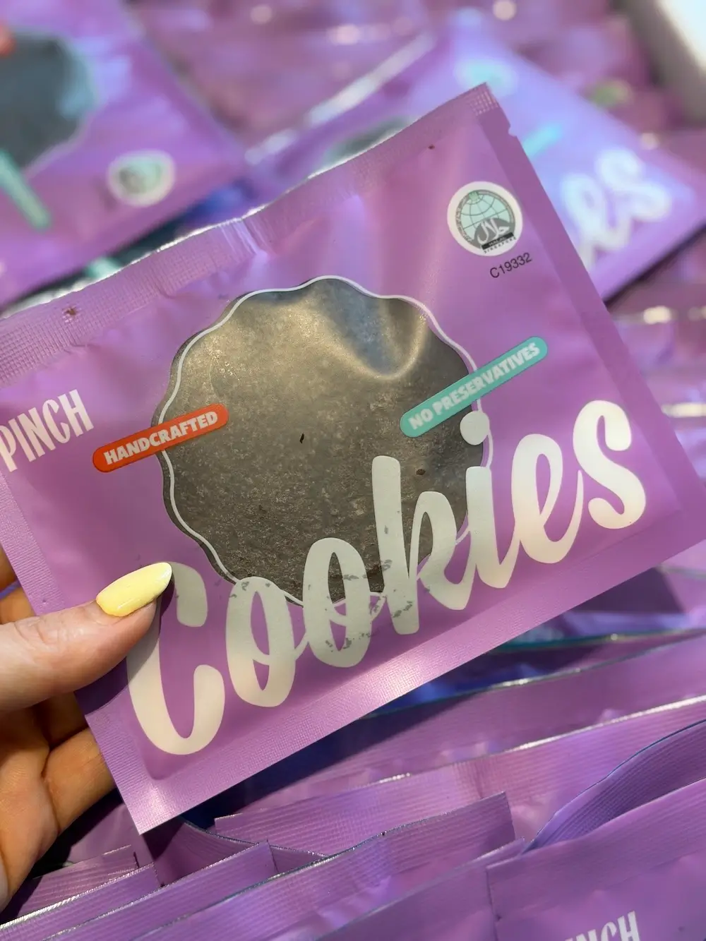 Close-up of Pinch Bakehouse halal-certified packaged cookies with halal certification mark